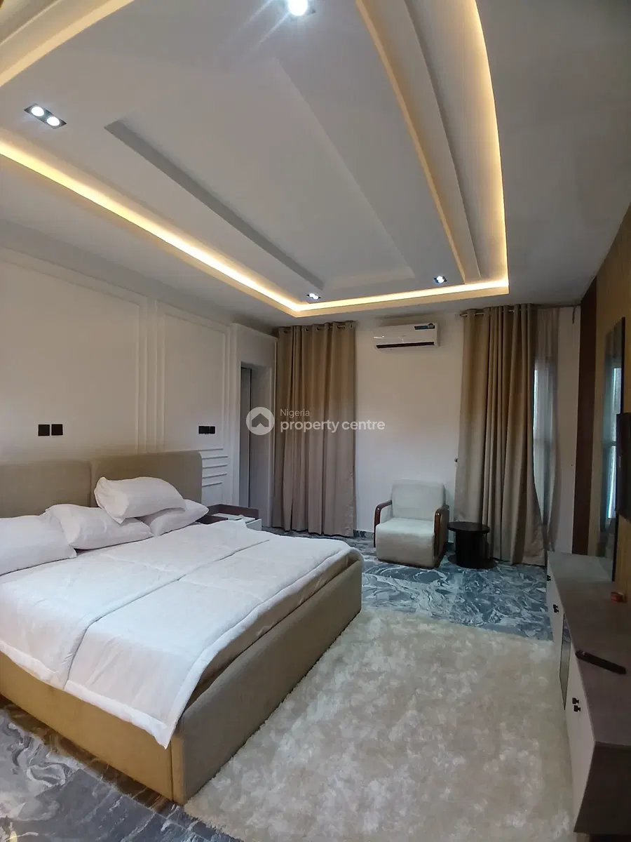 Alternate view of bedroom with white bedding