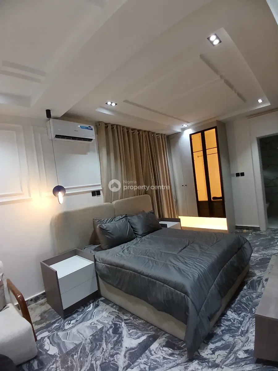 Alternate view of bedroom with grey bedding